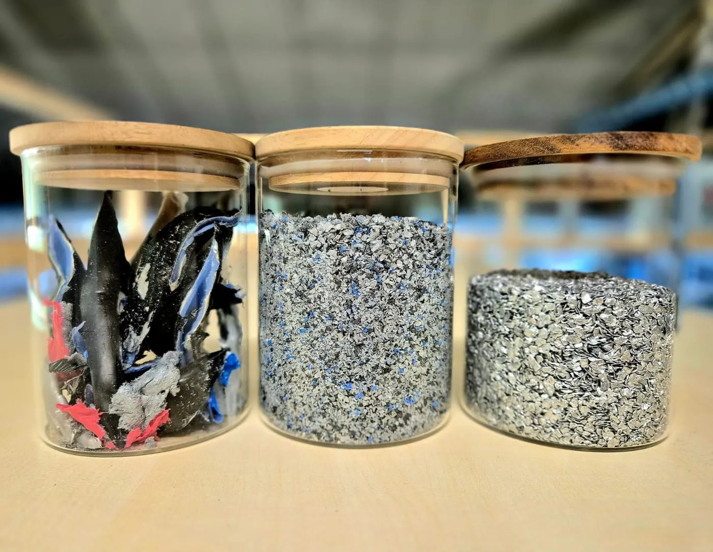 Samples of recovered materials displayed in jars